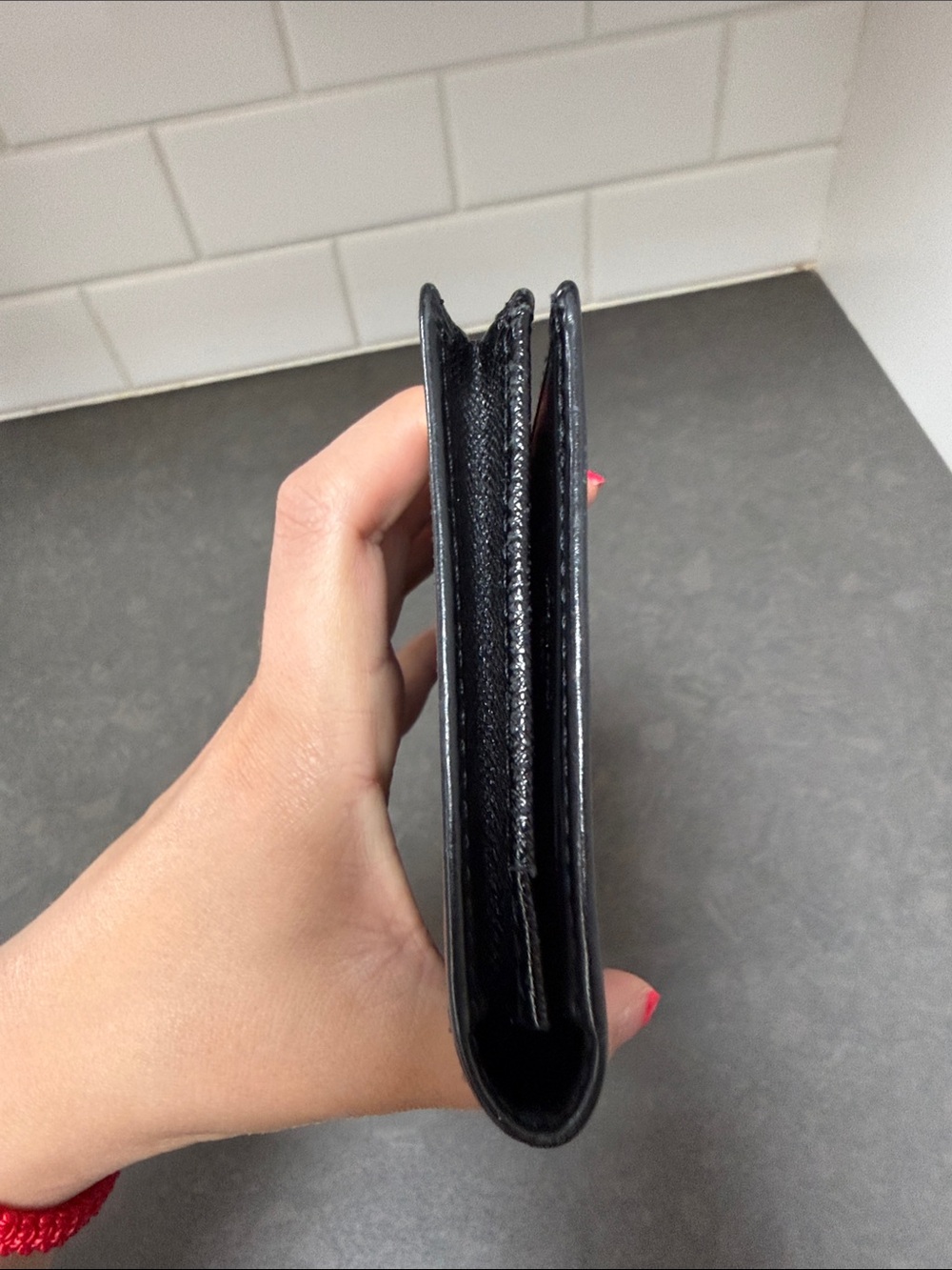 Louis Vuitton Vertical Wallet in black Epi 2006 - Picture 5 of 11
